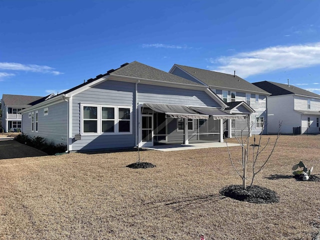 back of property featuring a patio