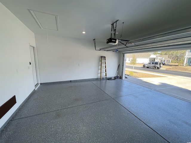 garage featuring a garage door opener