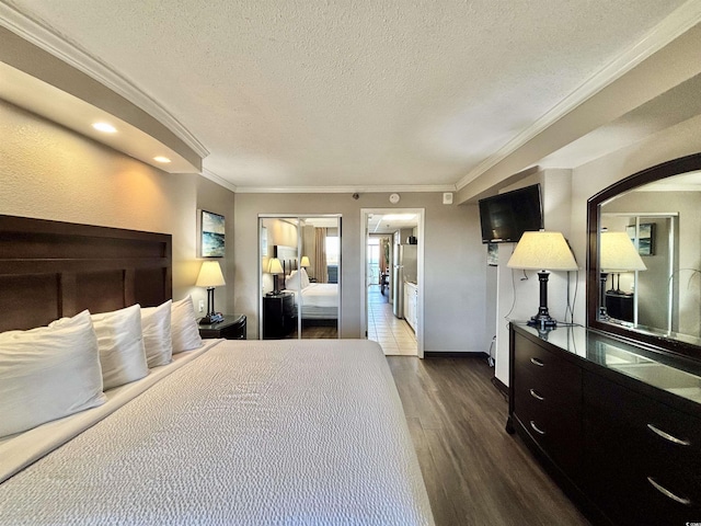 bedroom with a textured ceiling, recessed lighting, baseboards, ornamental molding, and dark wood-style floors