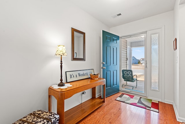 foyer featuring hardwood / wood-style flooring