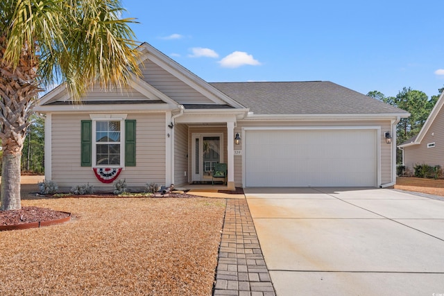 view of front of property with a garage