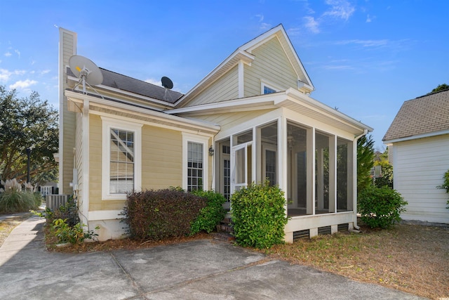 exterior space with a sunroom