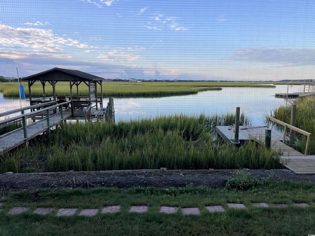 view of dock with a water view