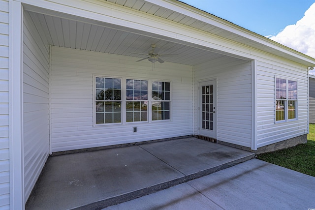 view of patio featuring ceiling fan