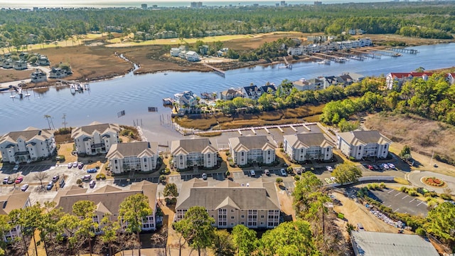 aerial view featuring a residential view and a water view