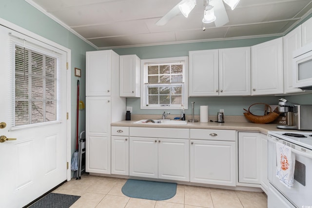 kitchen featuring white cabinetry, sink, ceiling fan, and white appliances