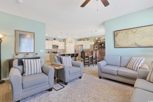 living room featuring ceiling fan