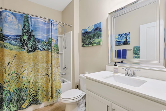 full bathroom featuring shower / tub combo with curtain, vanity, and toilet