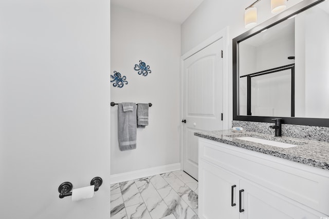 bathroom with vanity and walk in shower