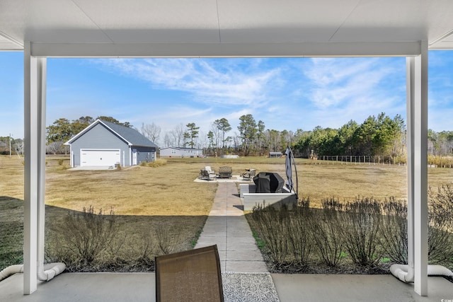 view of yard featuring a garage