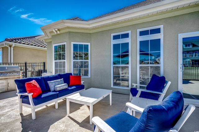 view of patio / terrace featuring area for grilling and outdoor lounge area