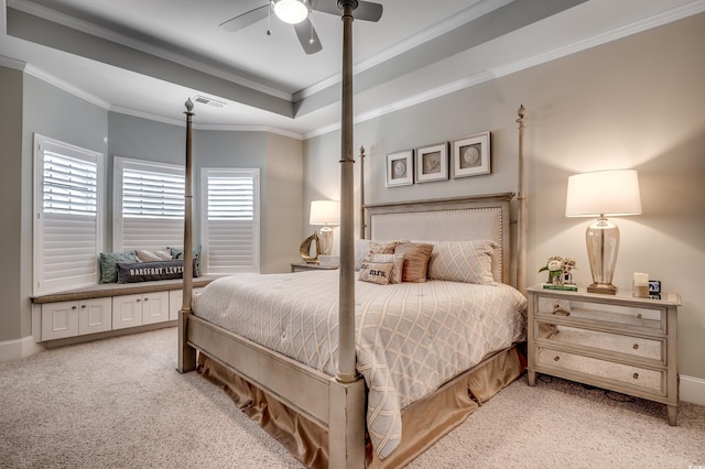 bedroom with light carpet, crown molding, a raised ceiling, and ceiling fan