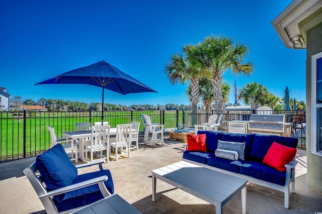 view of patio / terrace featuring a grill and an outdoor hangout area