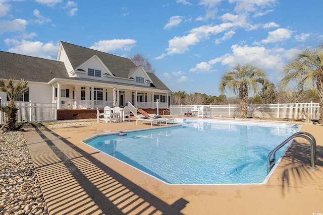 view of pool featuring a patio area