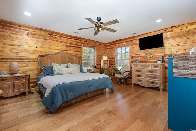 bedroom featuring ceiling fan and light wood-type flooring