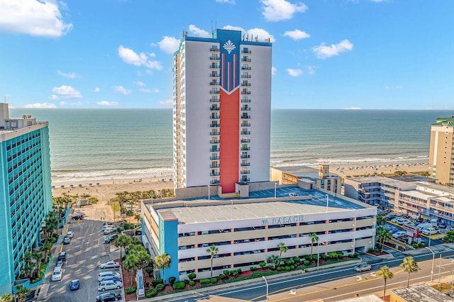 bird's eye view with a view of the beach and a water view