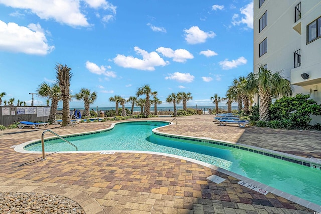 view of swimming pool featuring a patio