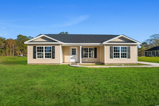 ranch-style house with a front yard