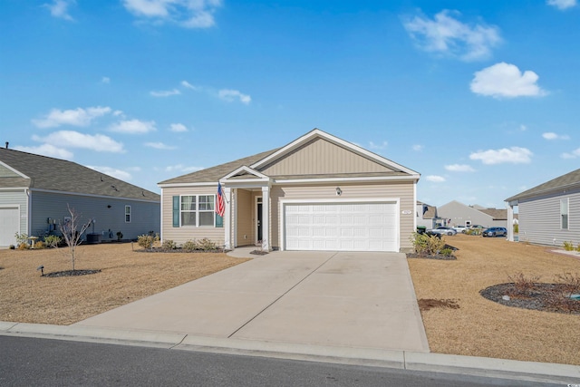 view of front of home featuring a garage and driveway