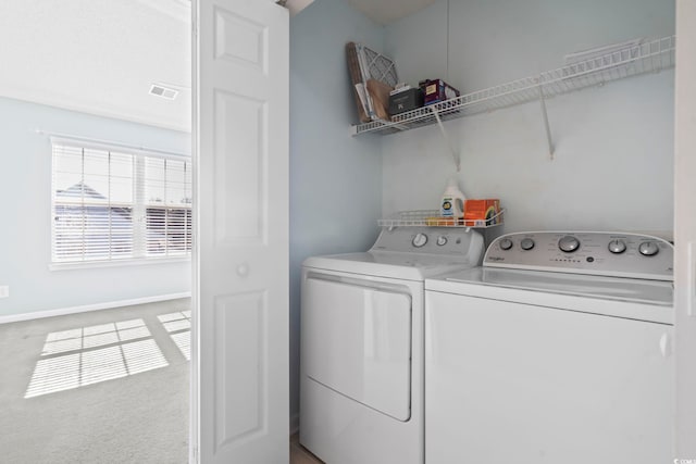 laundry room featuring carpet flooring and independent washer and dryer