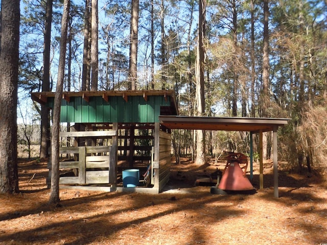 exterior space featuring an outbuilding