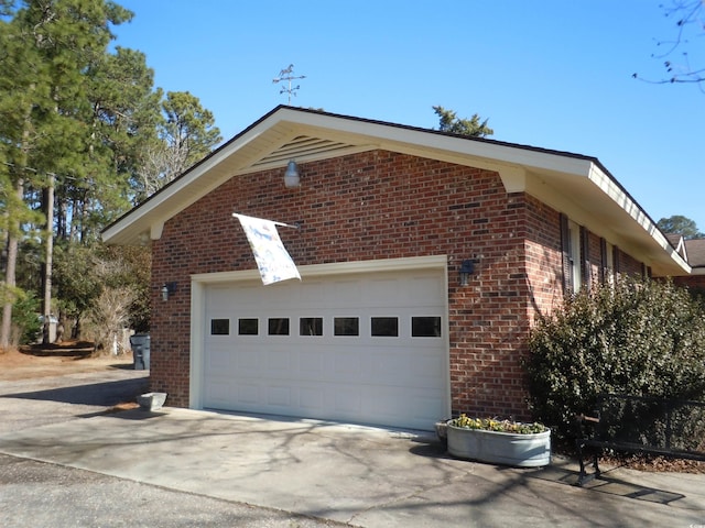 view of property exterior featuring a garage