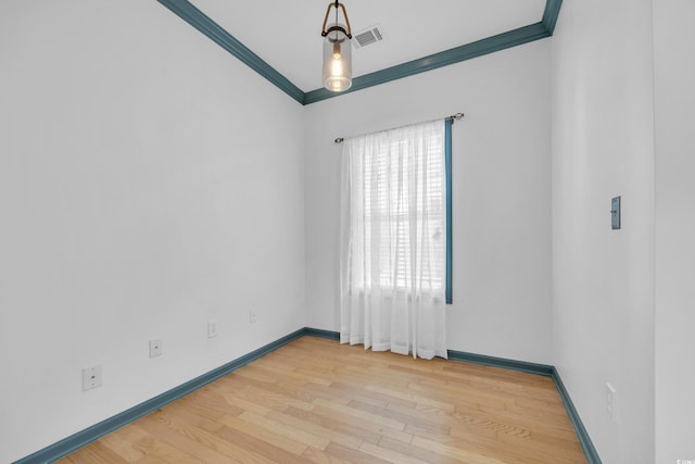 502 Hay Hill Ln Unit B, Myrtle Beach, SC 29579 - spare room with ornamental molding and light hardwood / wood-style floors