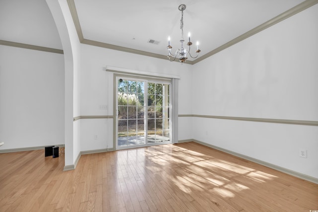 502 Hay Hill Ln Unit B, Myrtle Beach, SC 29579 - empty room with crown molding, a notable chandelier, and light hardwood / wood-style flooring