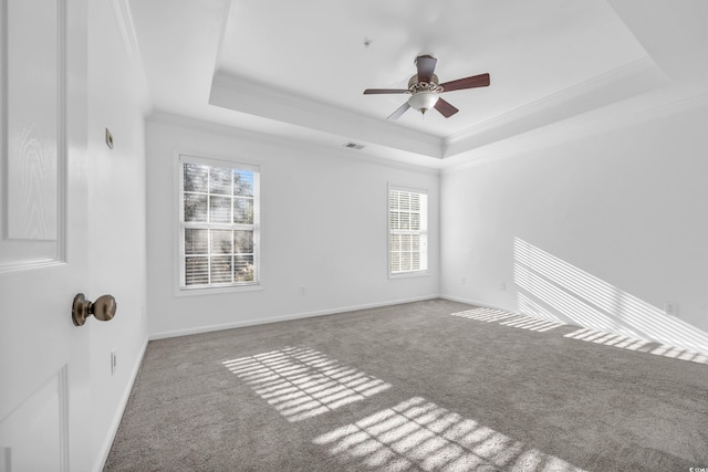 502 Hay Hill Ln Unit B, Myrtle Beach, SC 29579 - spare room featuring crown molding, a tray ceiling, ceiling fan, and carpet