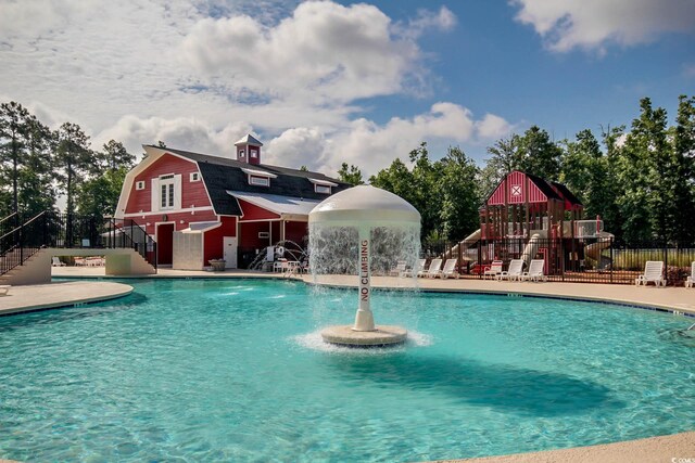 502 Hay Hill Ln Unit B, Myrtle Beach, SC 29579 - view of pool featuring pool water feature