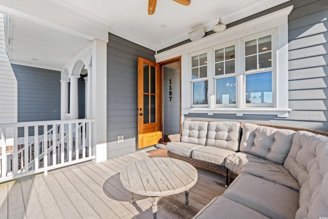 deck featuring an outdoor hangout area and ceiling fan