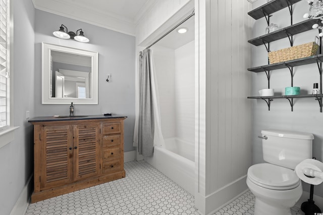 full bathroom featuring crown molding, vanity, shower / tub combo with curtain, and toilet