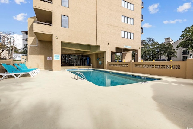 view of pool with a patio area