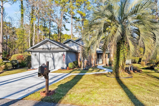 view of front facade featuring a garage and a front yard