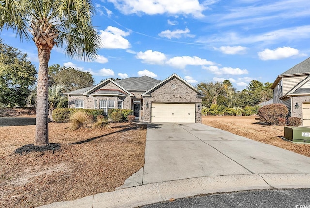 view of front of property with a garage