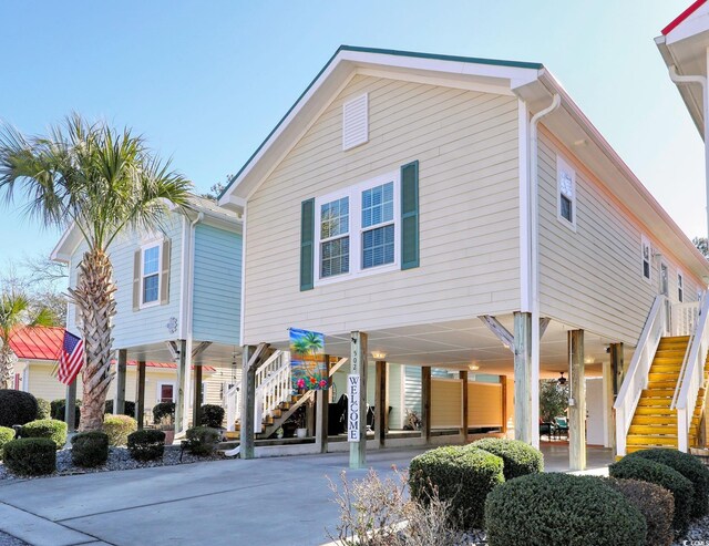 view of front of property with a carport