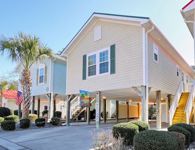 view of front of home featuring a carport