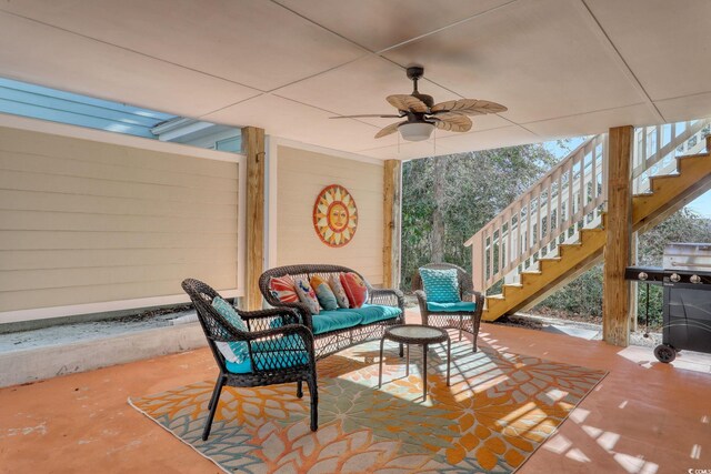 view of patio / terrace with ceiling fan and outdoor lounge area