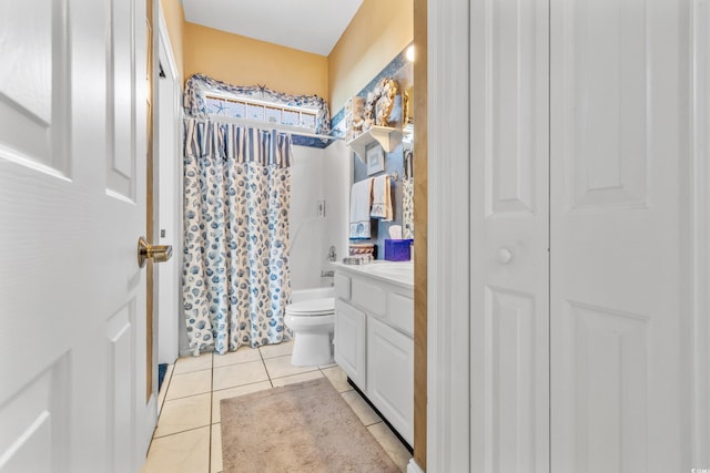 full bathroom featuring tile patterned flooring, vanity, shower / tub combo, and toilet