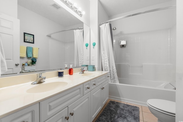 full bathroom with toilet, vanity, tile patterned floors, and shower / tub combo with curtain