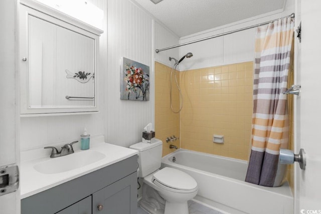 full bath featuring shower / bathtub combination with curtain, vanity, toilet, and a textured ceiling