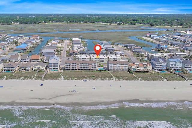 bird's eye view with a view of the beach and a water view