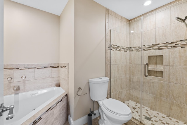 bathroom with toilet and separate shower and tub