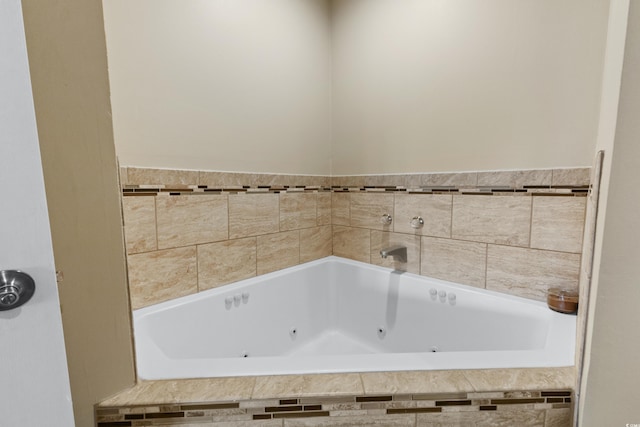 bathroom featuring tiled bath