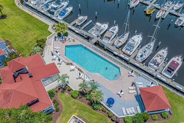 birds eye view of property featuring a water view