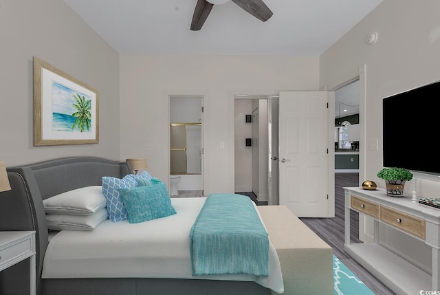 bedroom featuring hardwood / wood-style flooring, ceiling fan, and ensuite bathroom