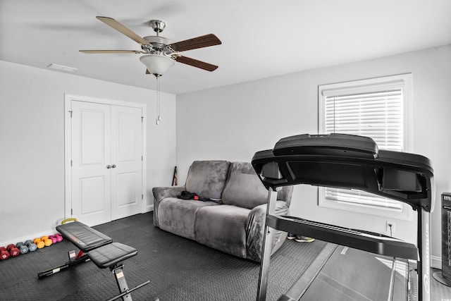 workout area with carpet floors and ceiling fan