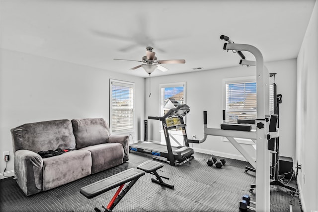 workout room featuring ceiling fan