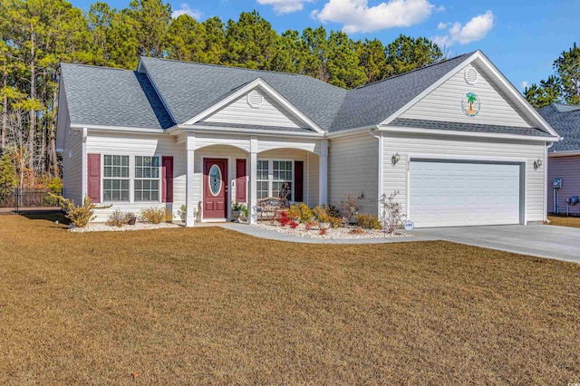 ranch-style home with a garage and a front yard