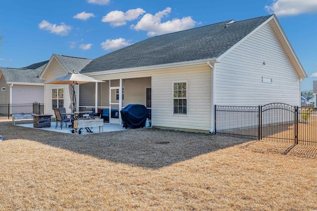 back of house featuring a patio area